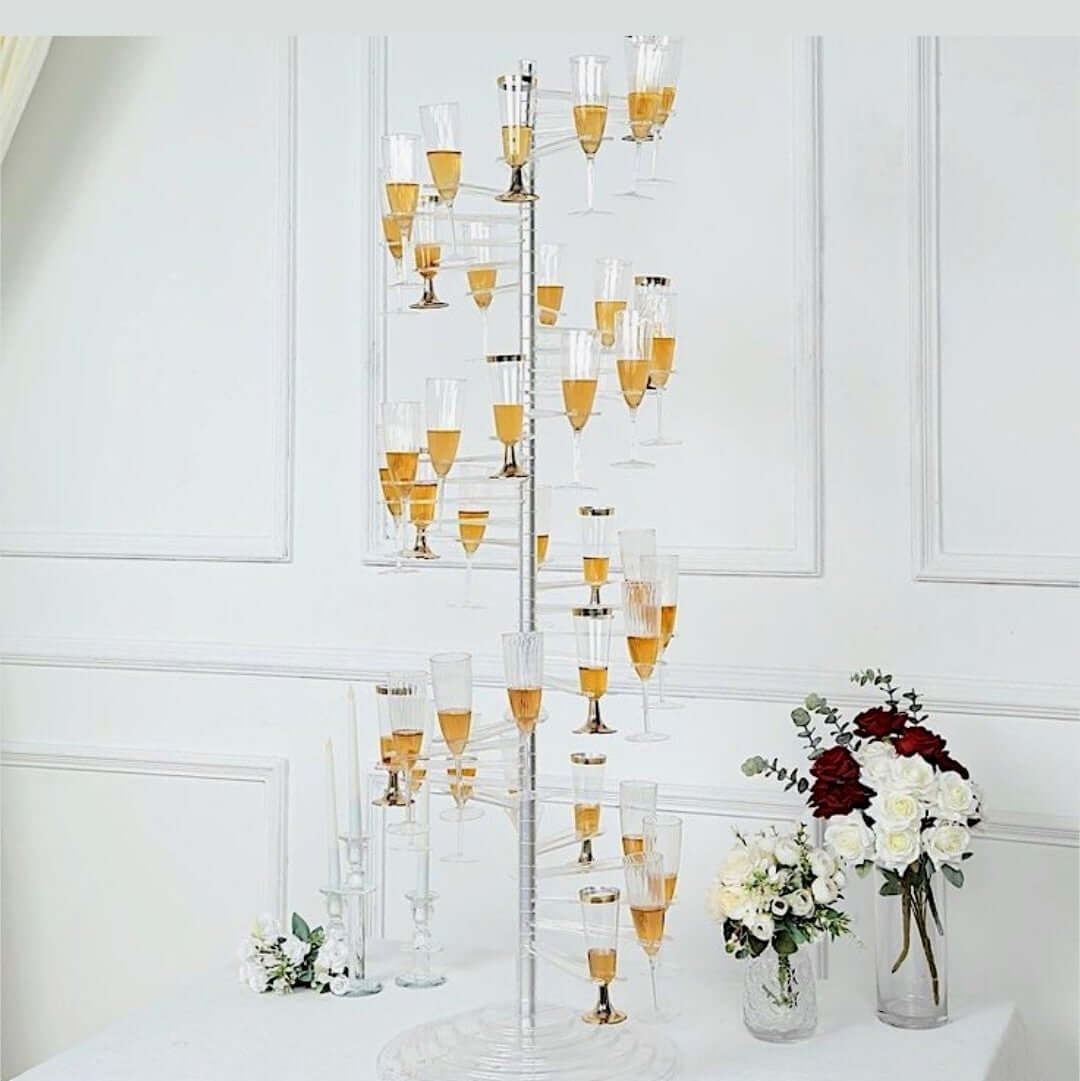 Spiral acrylic champagne flute holder displaying champagne drinks in a modern, elegant arrangement.